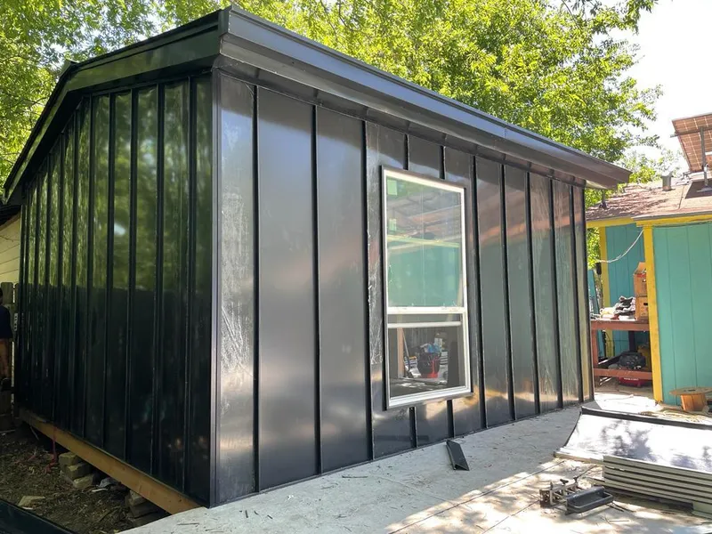 Black standing seam metal wall panels for Roof Inspection in Prospect Park