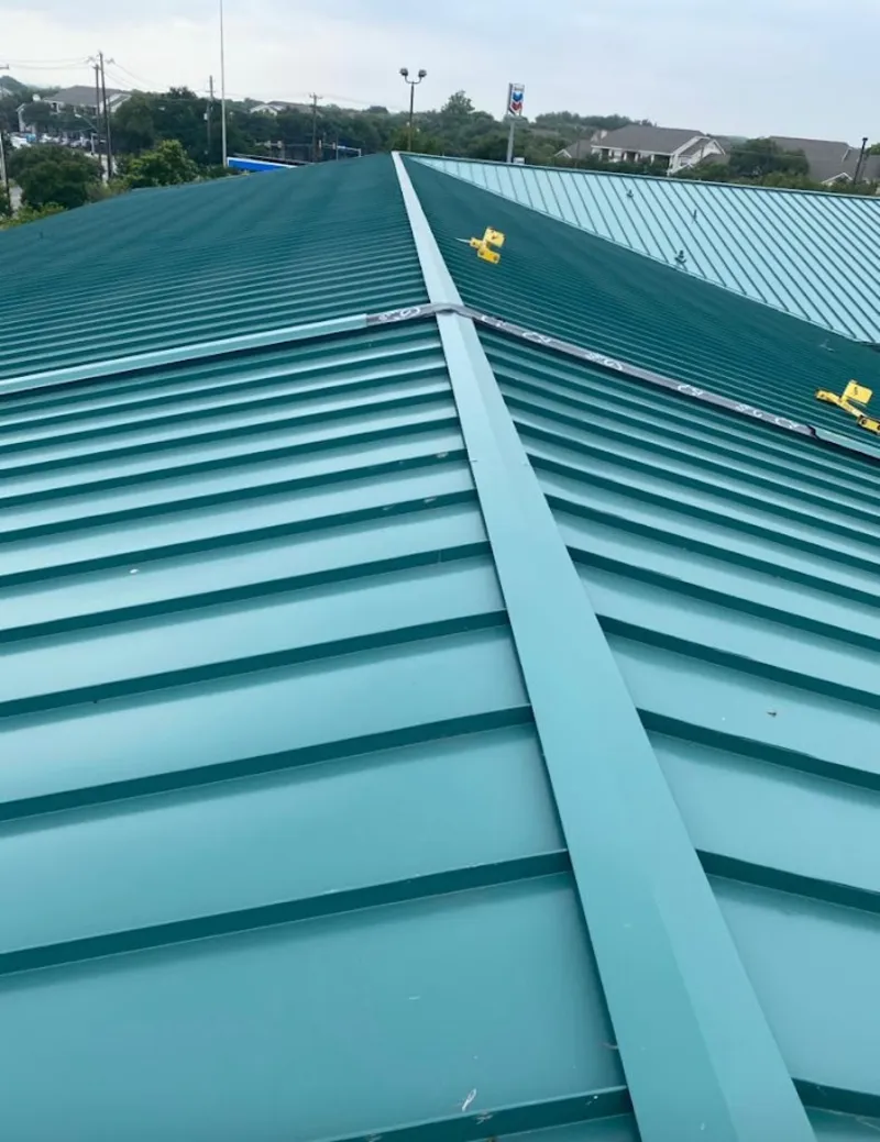 Green commercial metal roof ridge and valley for Metal Roof Repair in Prospect Park