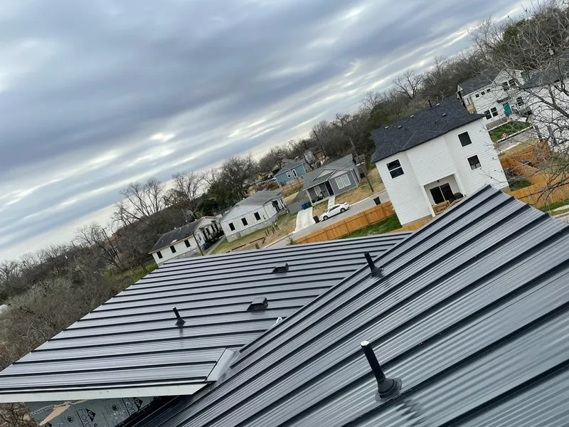 Standing seam metal roof panels with vents for Skylight Repair in Prospect Park